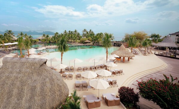 2 outdoor pools, pool umbrellas, pool loungers