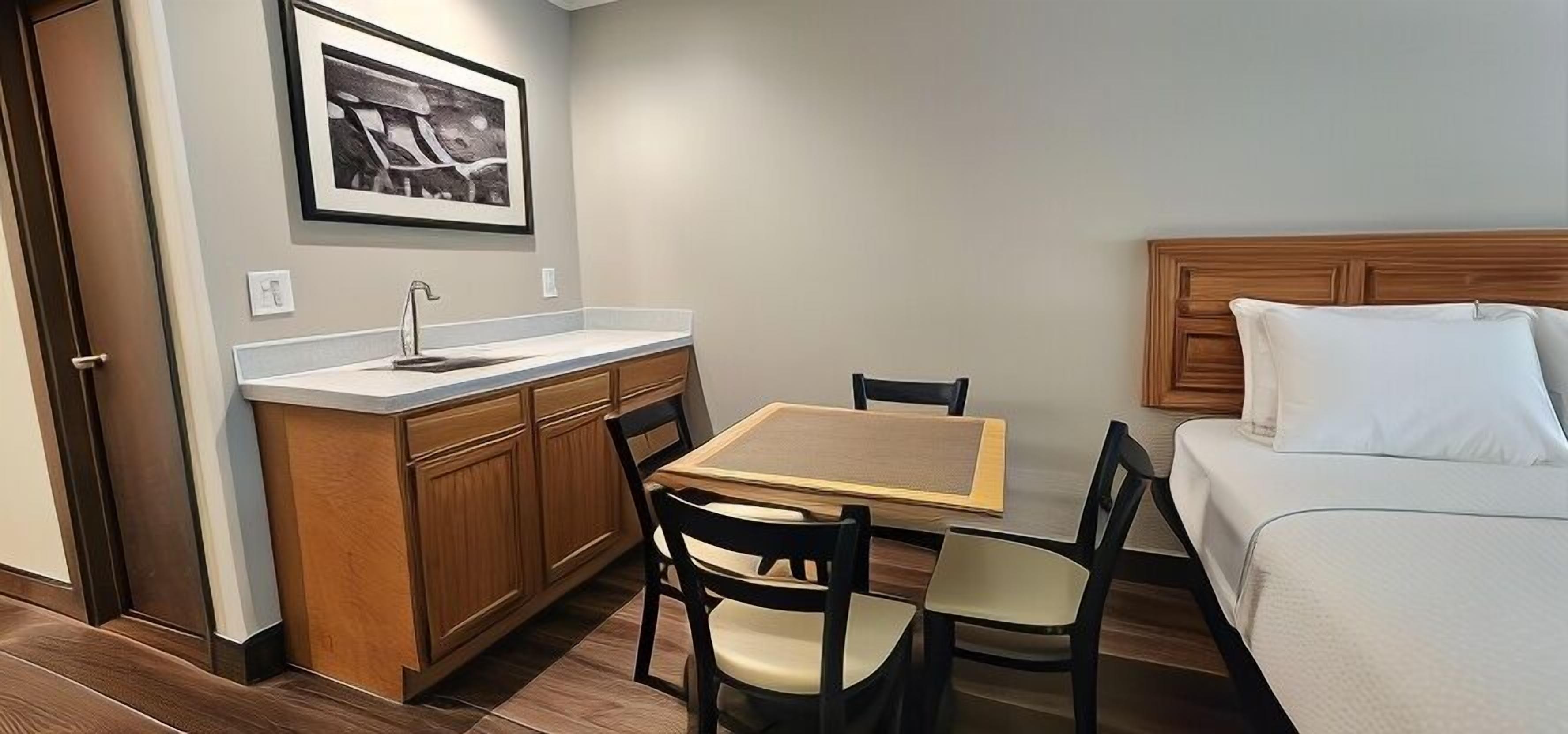 Desk, laptop workspace, iron/ironing board, rollaway beds