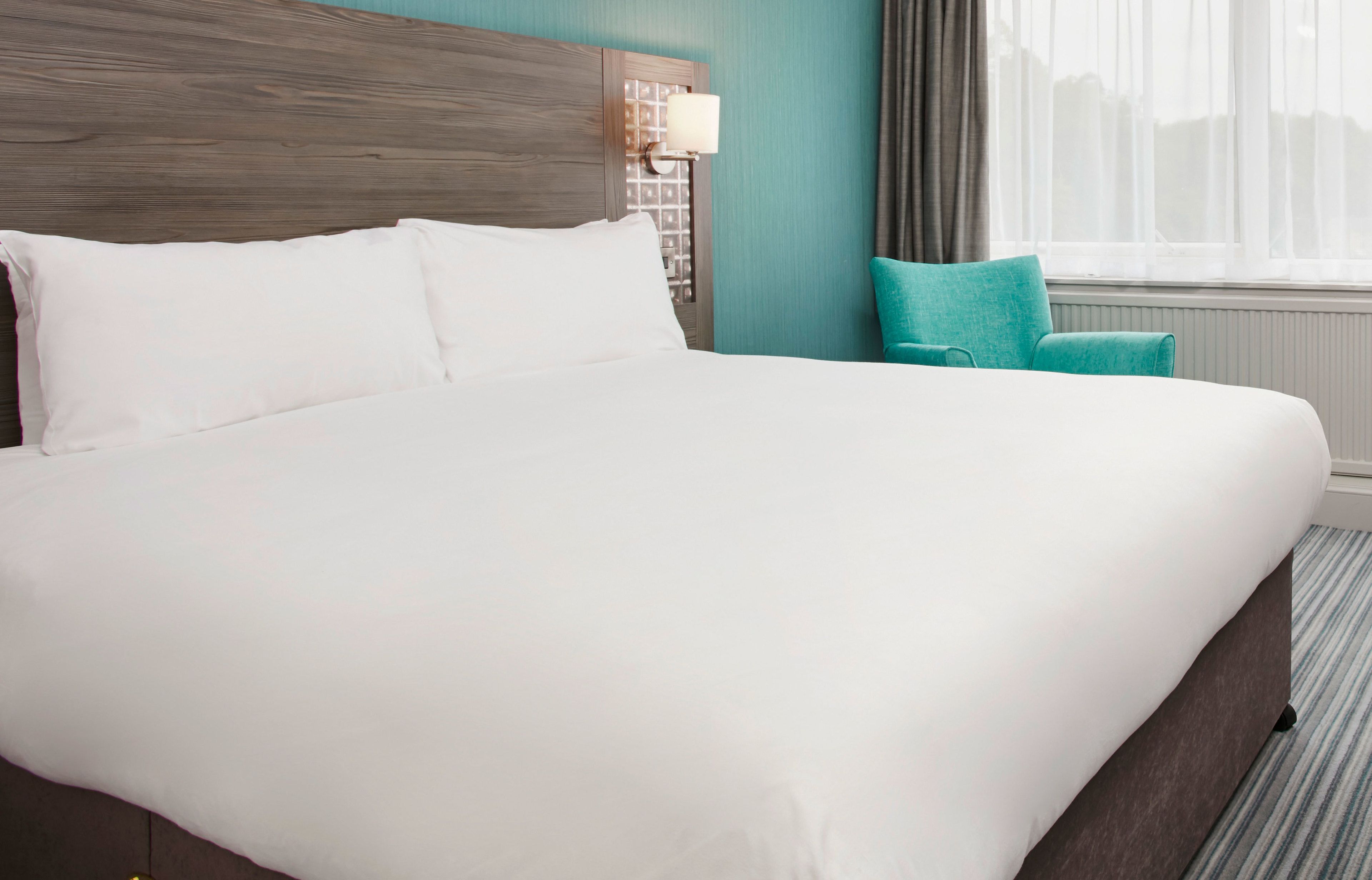 Desk, blackout drapes, iron/ironing board, travel crib