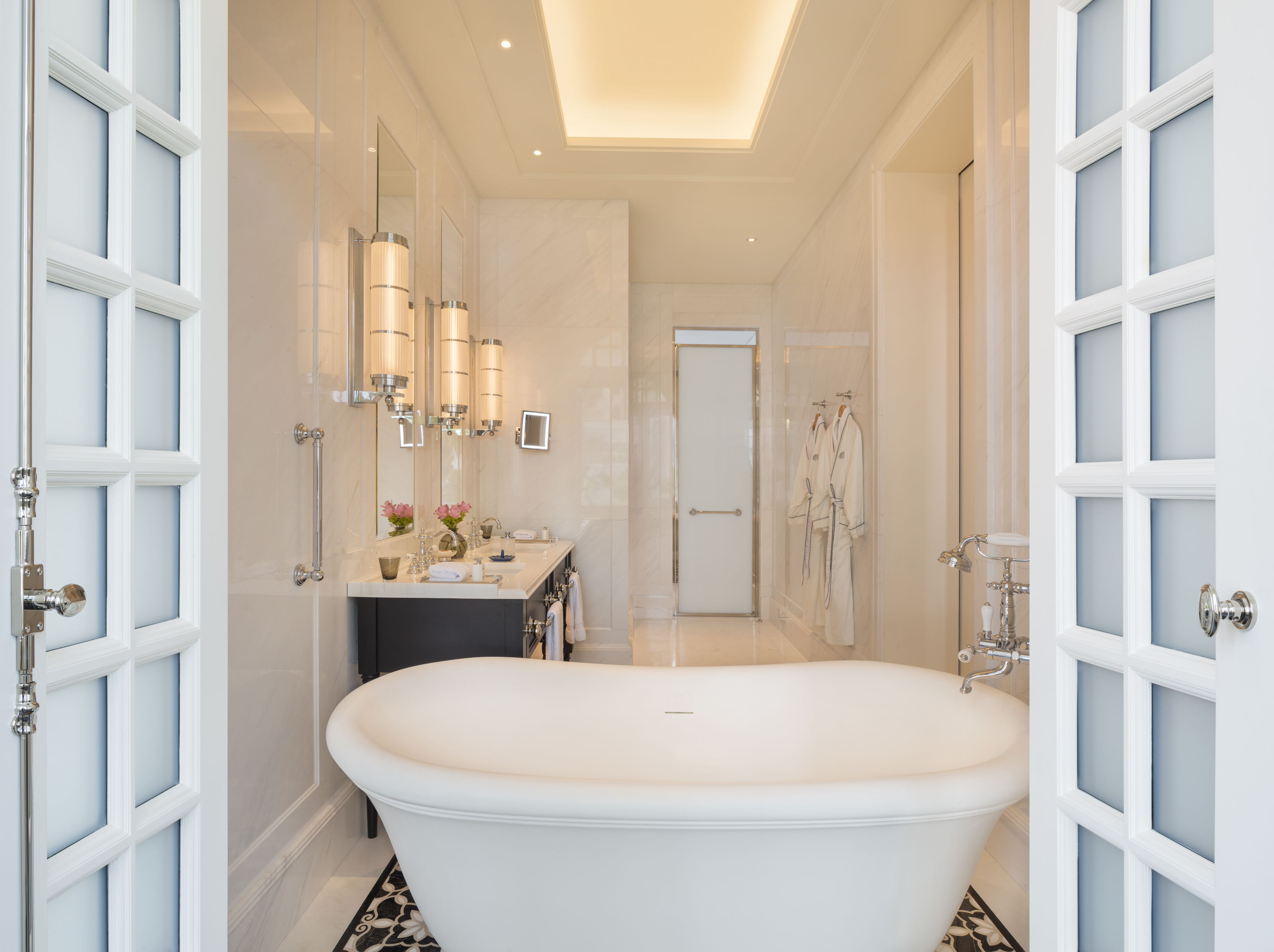 separate bathtub and shower, deep-soaking bathtub, rainfall showerhead