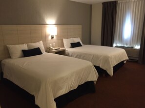 Standard Double Room | Down comforters, in-room safe, desk, blackout drapes