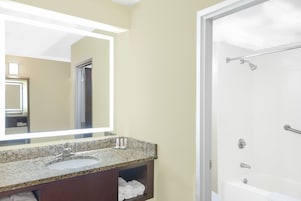 Combined shower/tub, deep soaking tub, free toiletries, hair dryer