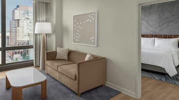 Premium bedding, down comforters, in-room safe, desk