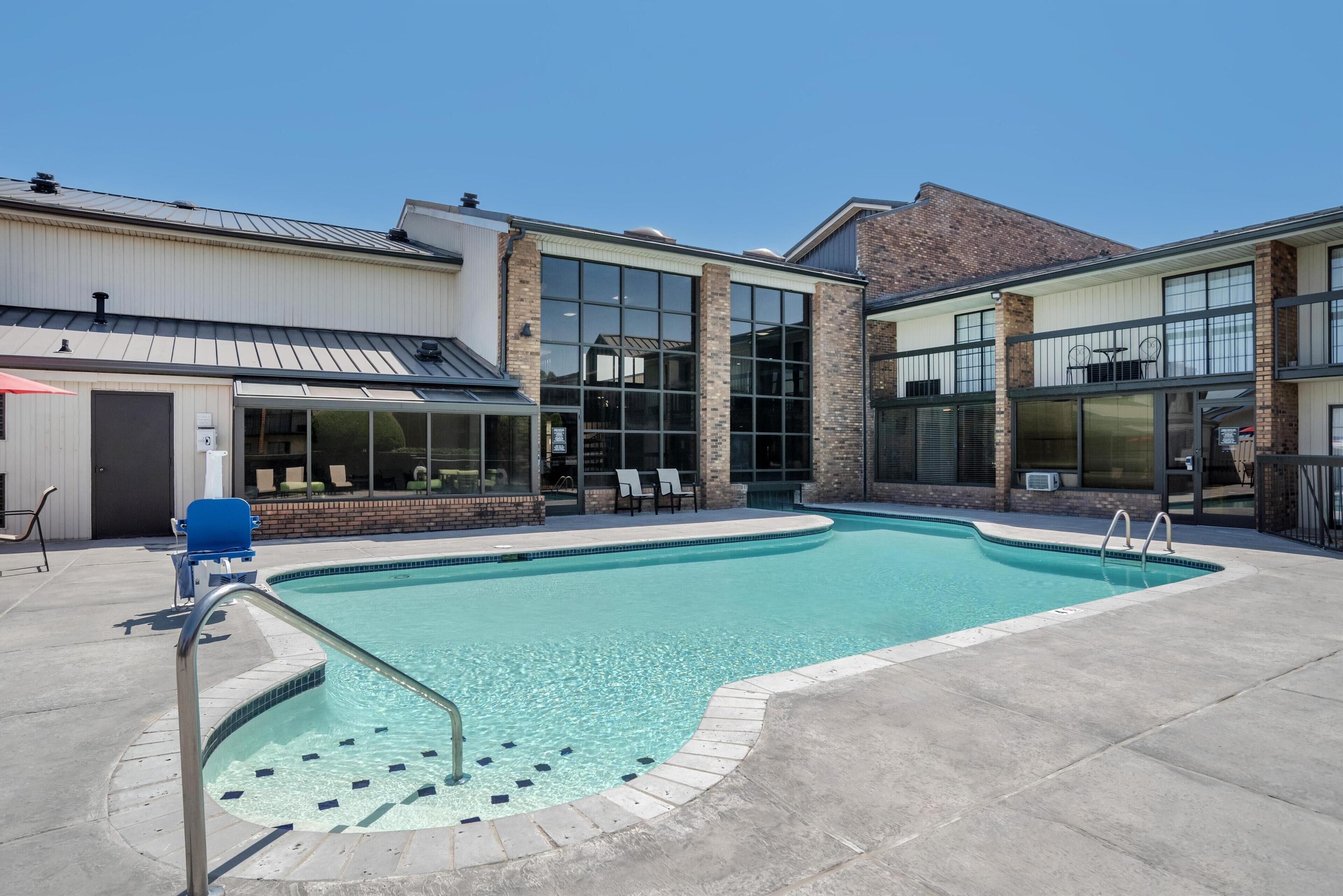 Seasonal outdoor pool, pool umbrellas, pool loungers