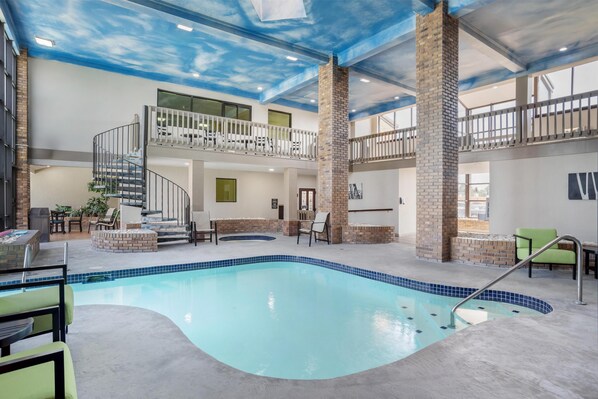 Seasonal outdoor pool, pool umbrellas, sun loungers - SureStay Plus Hotel by Best Western Greenwood (Greenwood)