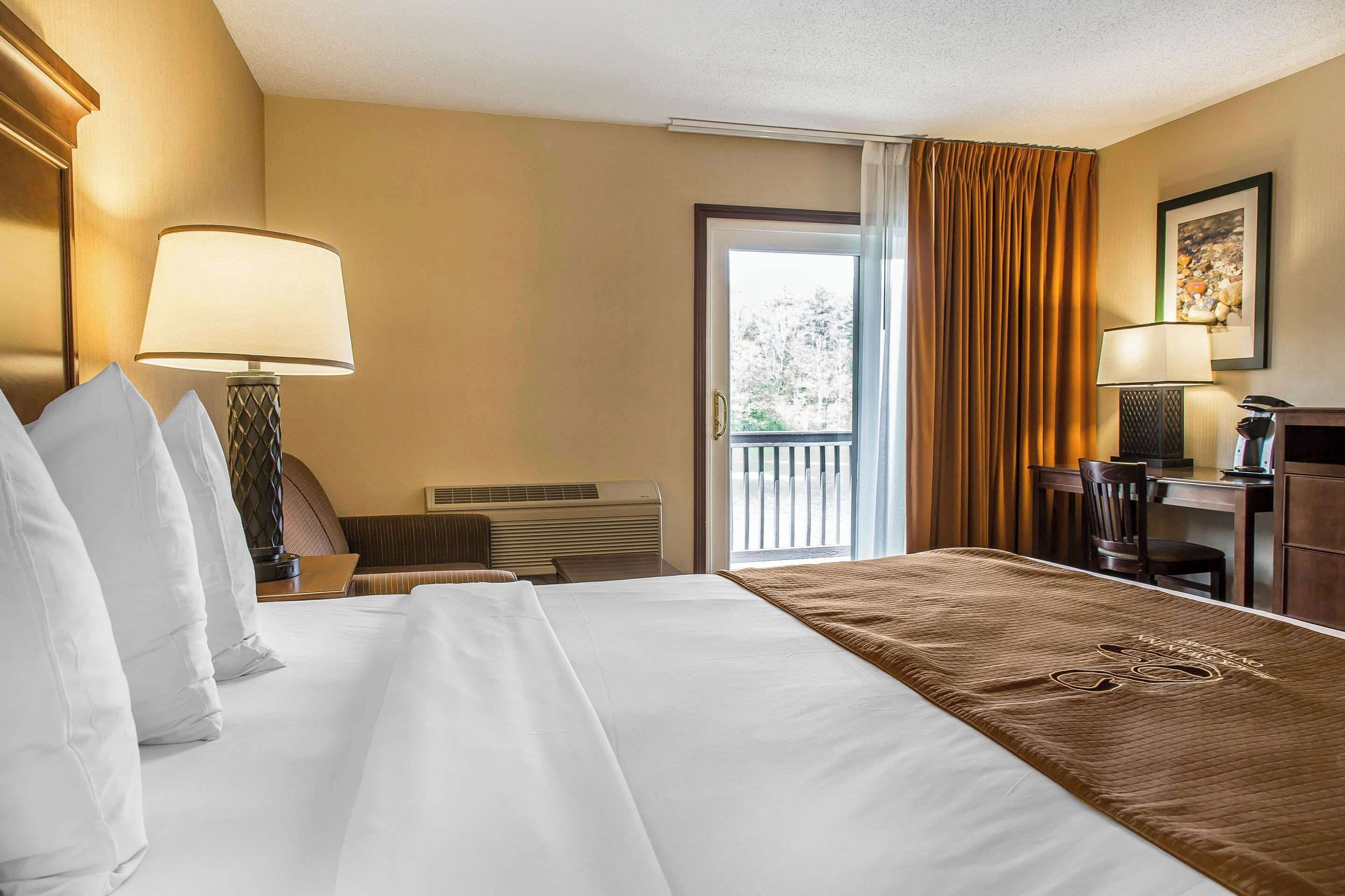 lakeside deluxe room, 1 king bed | premium bedding, desk, laptop workspace, blackout curtains