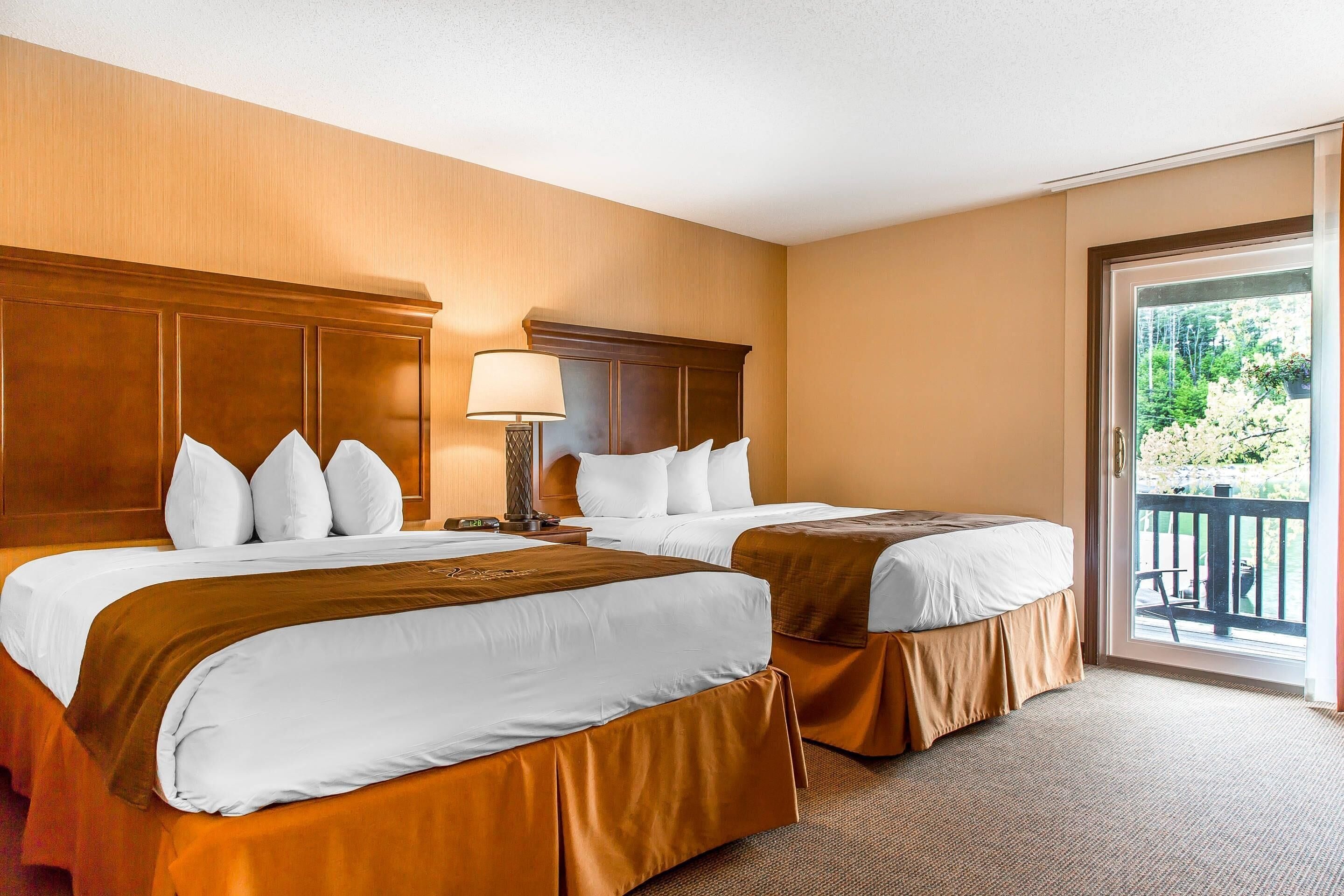 Premium bedding, desk, laptop workspace, blackout curtains