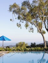 Outdoor pool, pool umbrellas, sun loungers