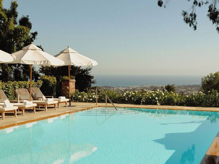 Outdoor pool, pool umbrellas, sun loungers