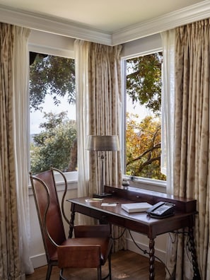 Premium bedding, down comforters, minibar, in-room safe