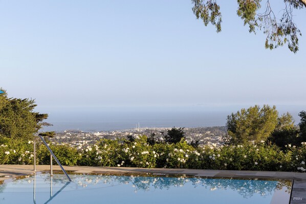 Outdoor pool, pool umbrellas, pool loungers