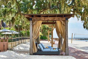 On the beach, beach cabanas, sun-loungers, beach umbrellas