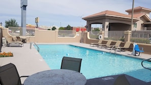 Seasonal outdoor pool, open 3 PM to 10 PM, pool loungers