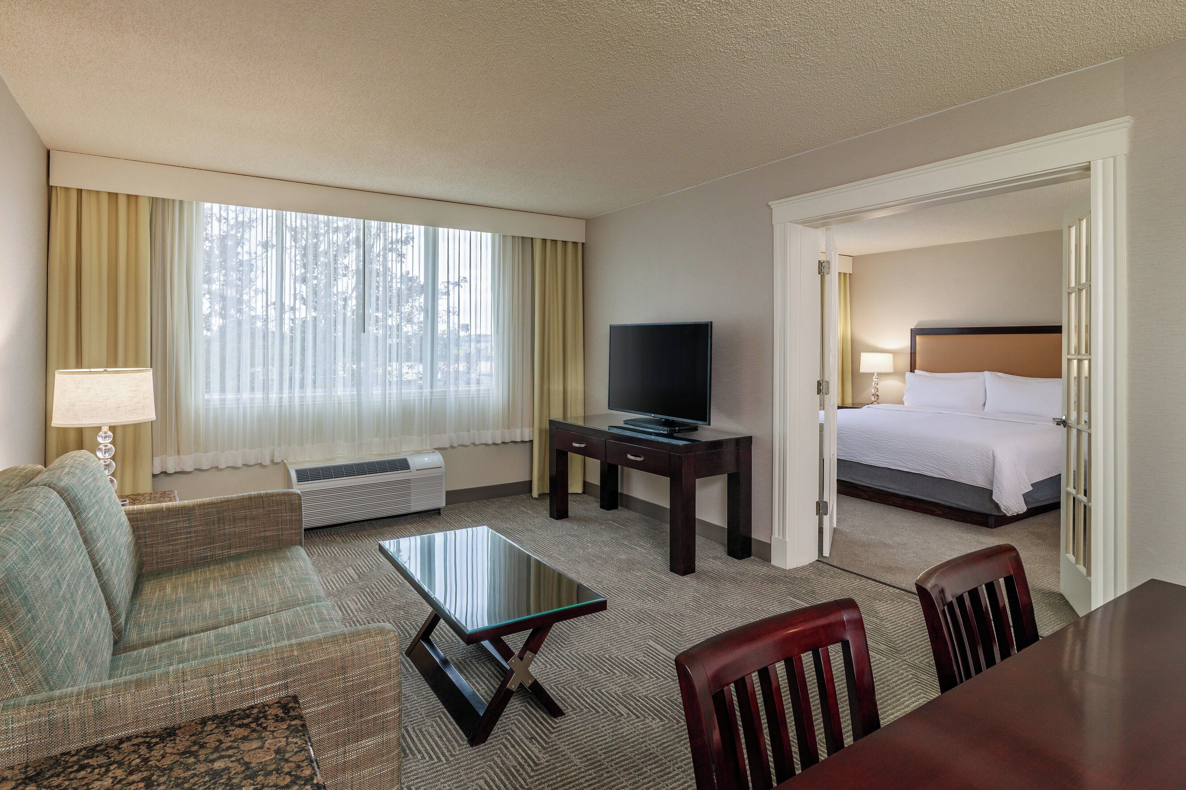 Desk, blackout drapes, iron/ironing board, free cribs/infant beds