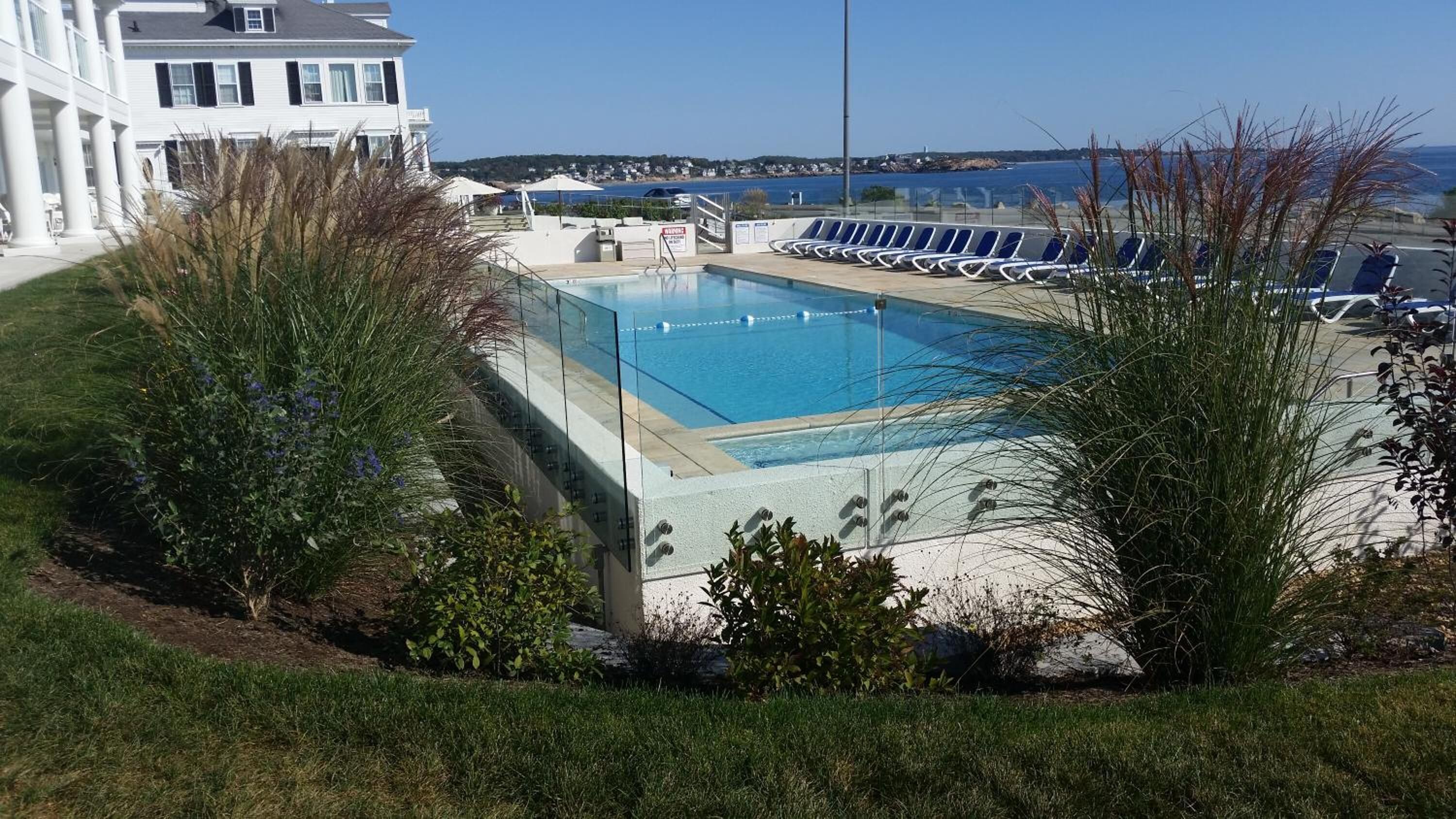 seasonal outdoor pool, pool loungers
