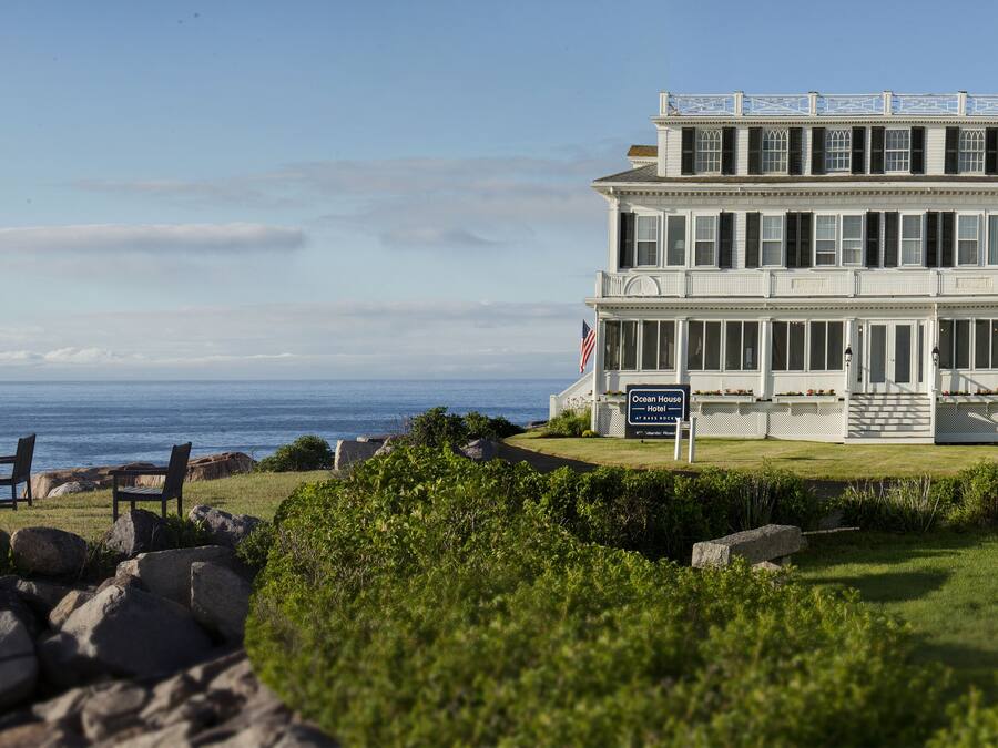 A two-story building with a sign reading "Ocean House."