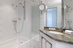 Combined shower/bathtub, free toiletries, hair dryer, bathrobes