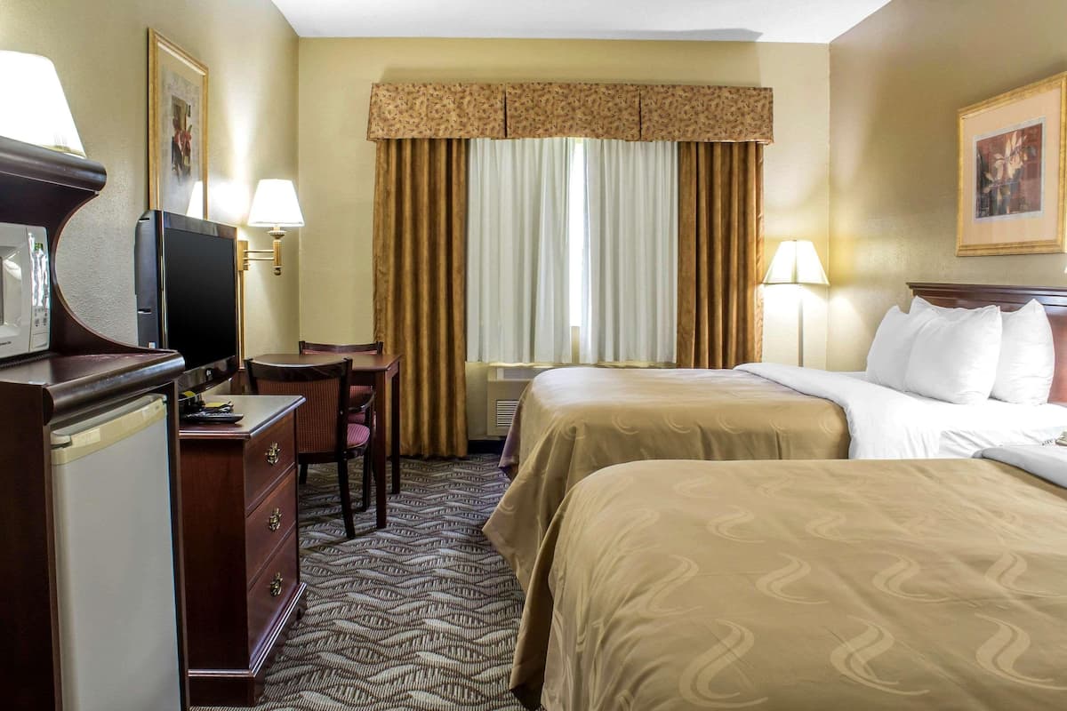 Down comforters, pillowtop beds, in-room safe, desk