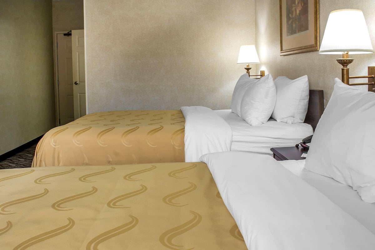 Down comforters, pillowtop beds, in-room safe, desk
