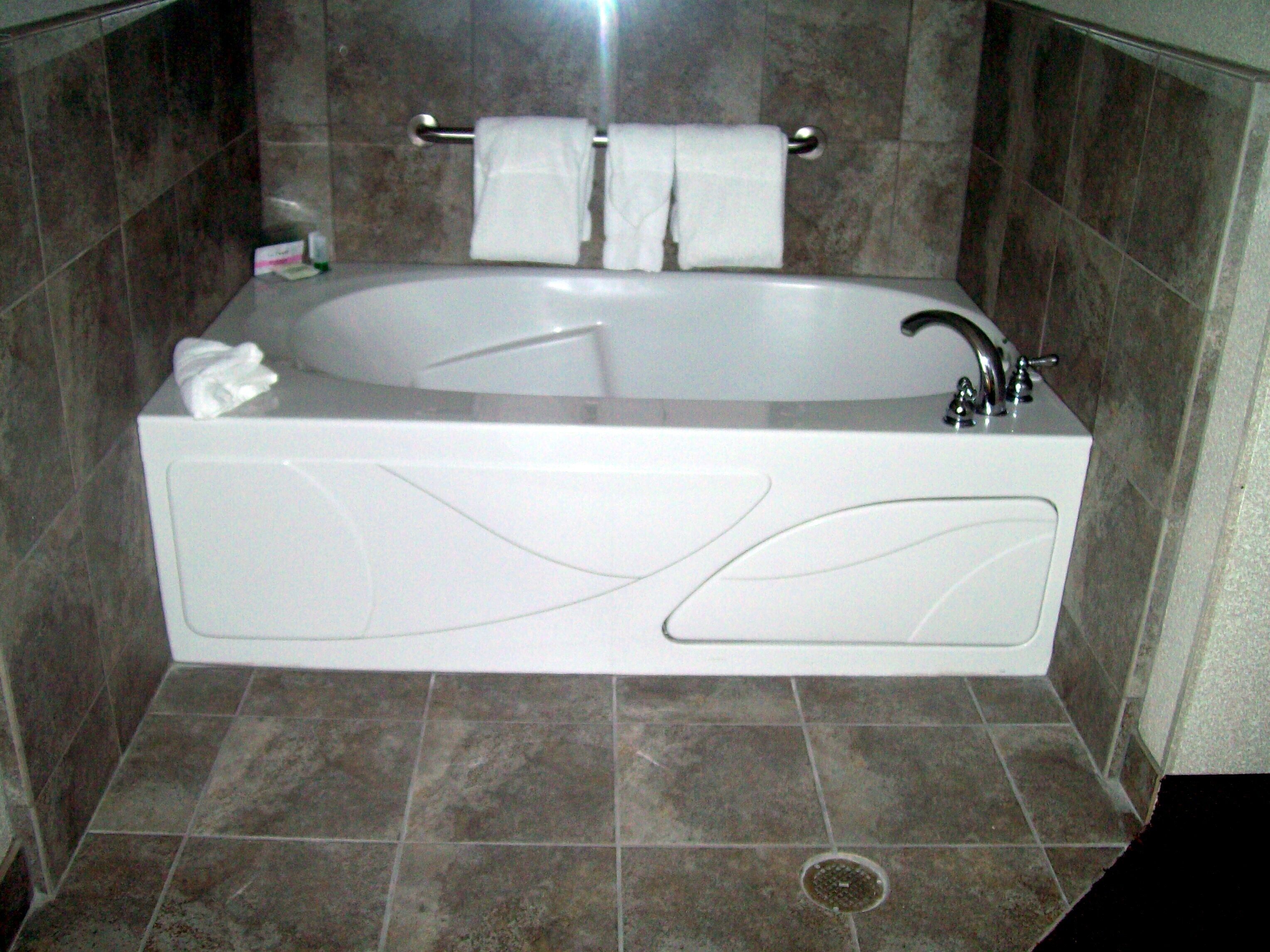 room, 1 king bed, non smoking, jetted tub | in-room safe, desk, blackout curtains, iron/ironing board