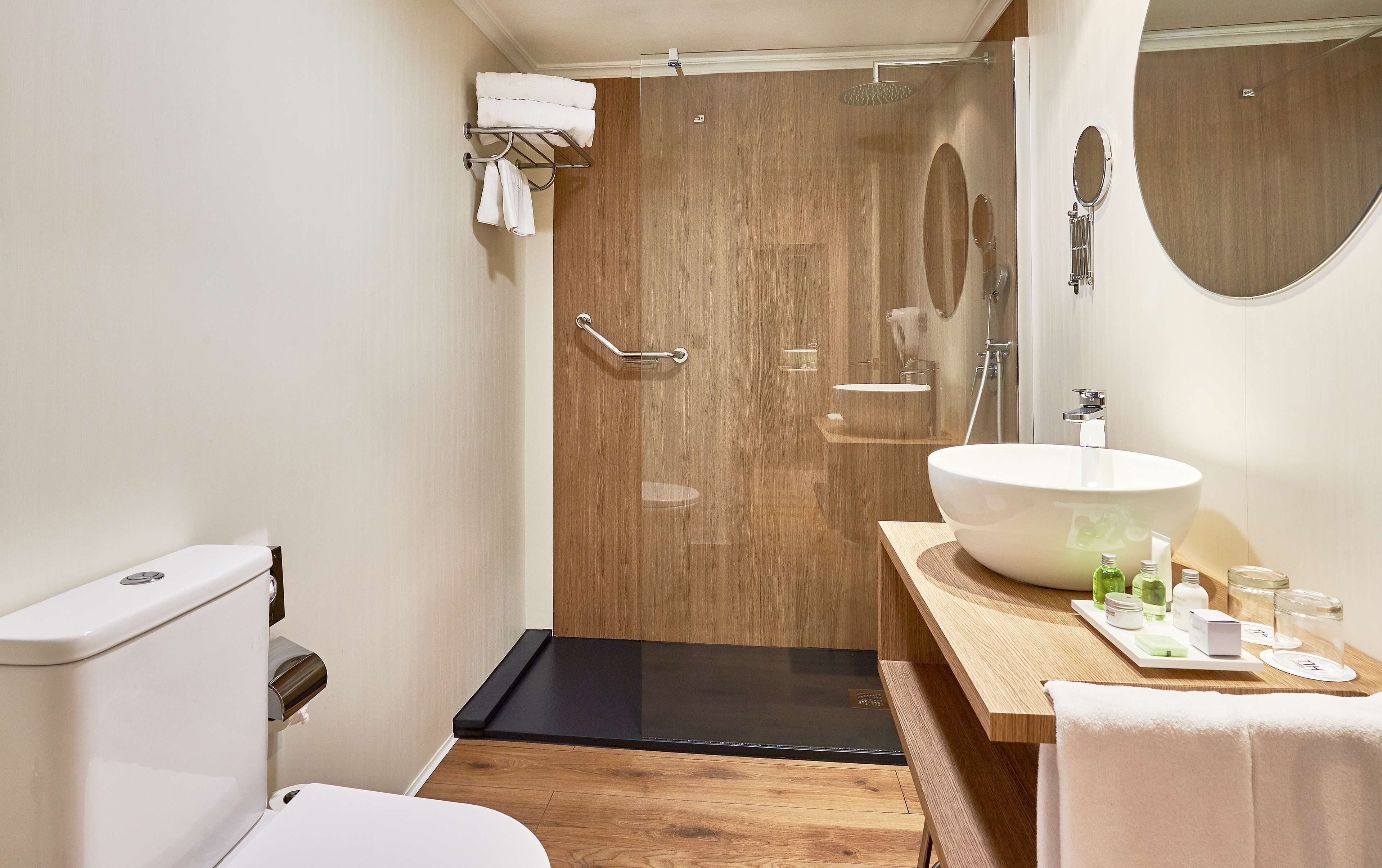 combined shower/bathtub, eco-friendly toiletries, hair dryer, bathrobes