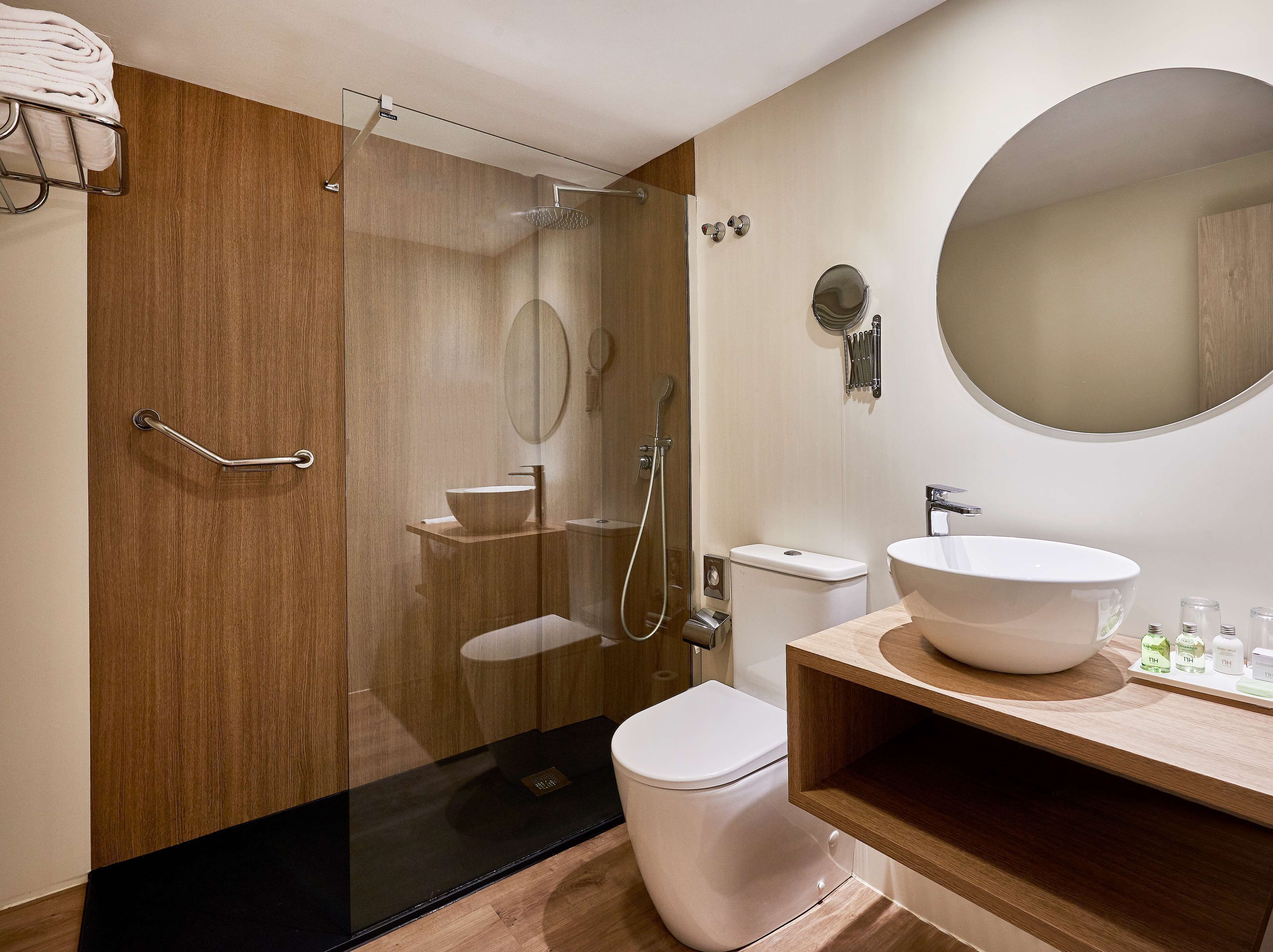 combined shower/bathtub, eco-friendly toiletries, hair dryer, bathrobes