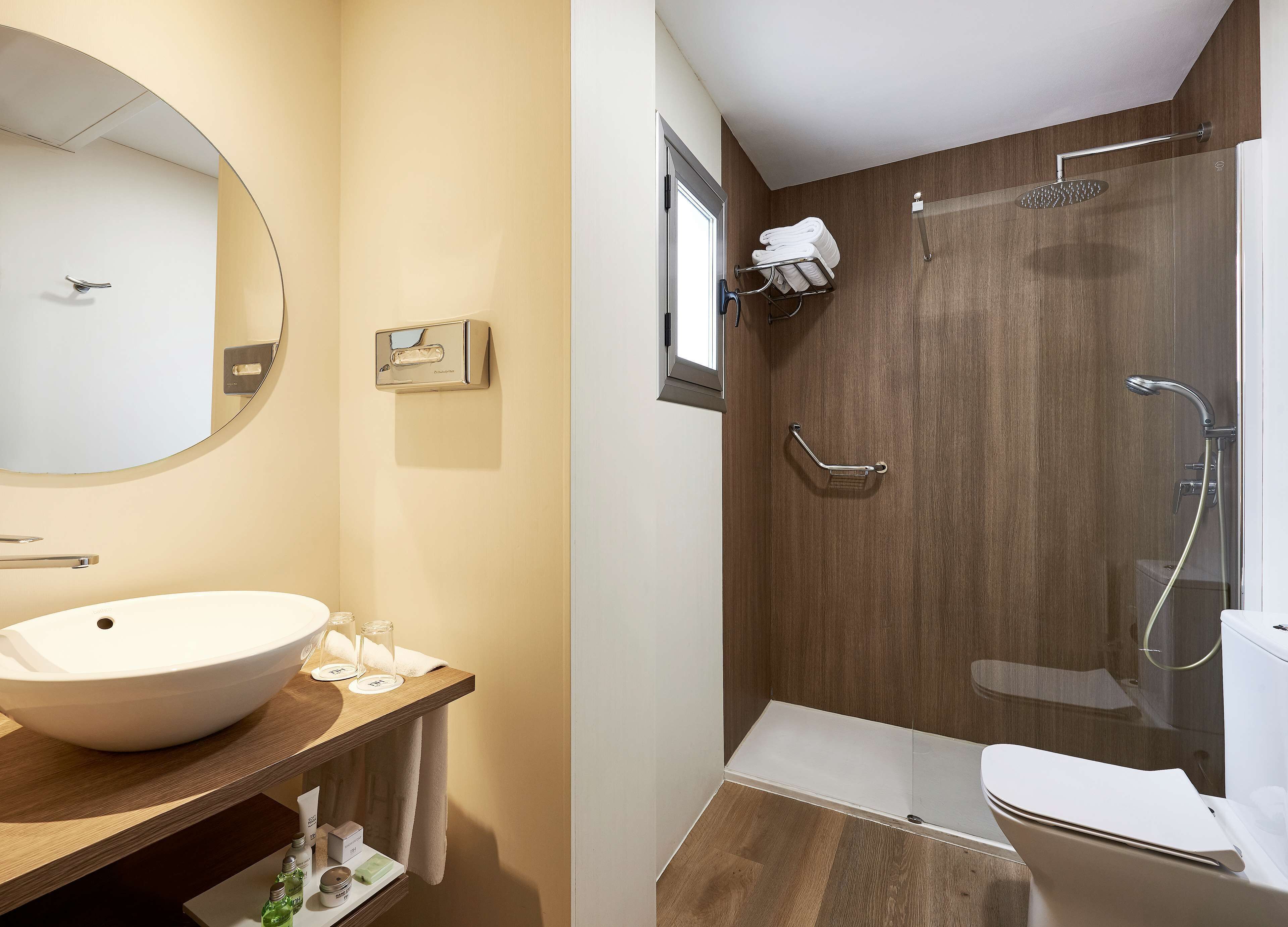 combined shower/bathtub, eco-friendly toiletries, hair dryer, bathrobes