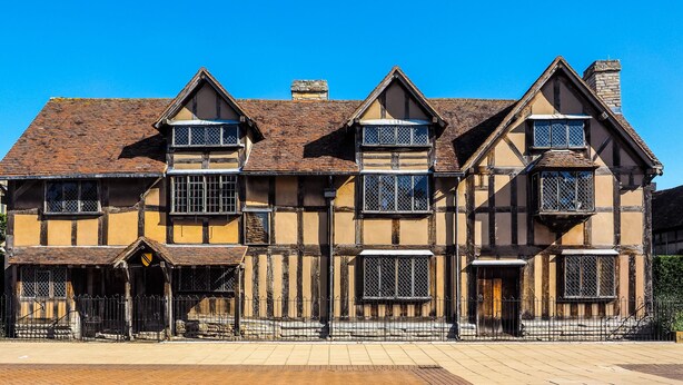A traditional half-timbered building with multiple windows and a prominent entrance. - Holiday Inn Leamington Spa - Warwick by IHG (Warwick)