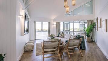 Grand Bungalow, Overwater | Individually decorated, desk, laptop workspace, iron/ironing board