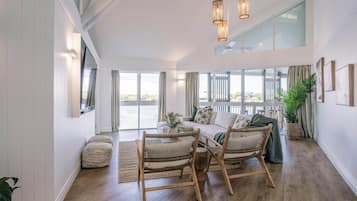 Grand Bungalow, Overwater | Individually decorated, desk, laptop workspace, iron/ironing board