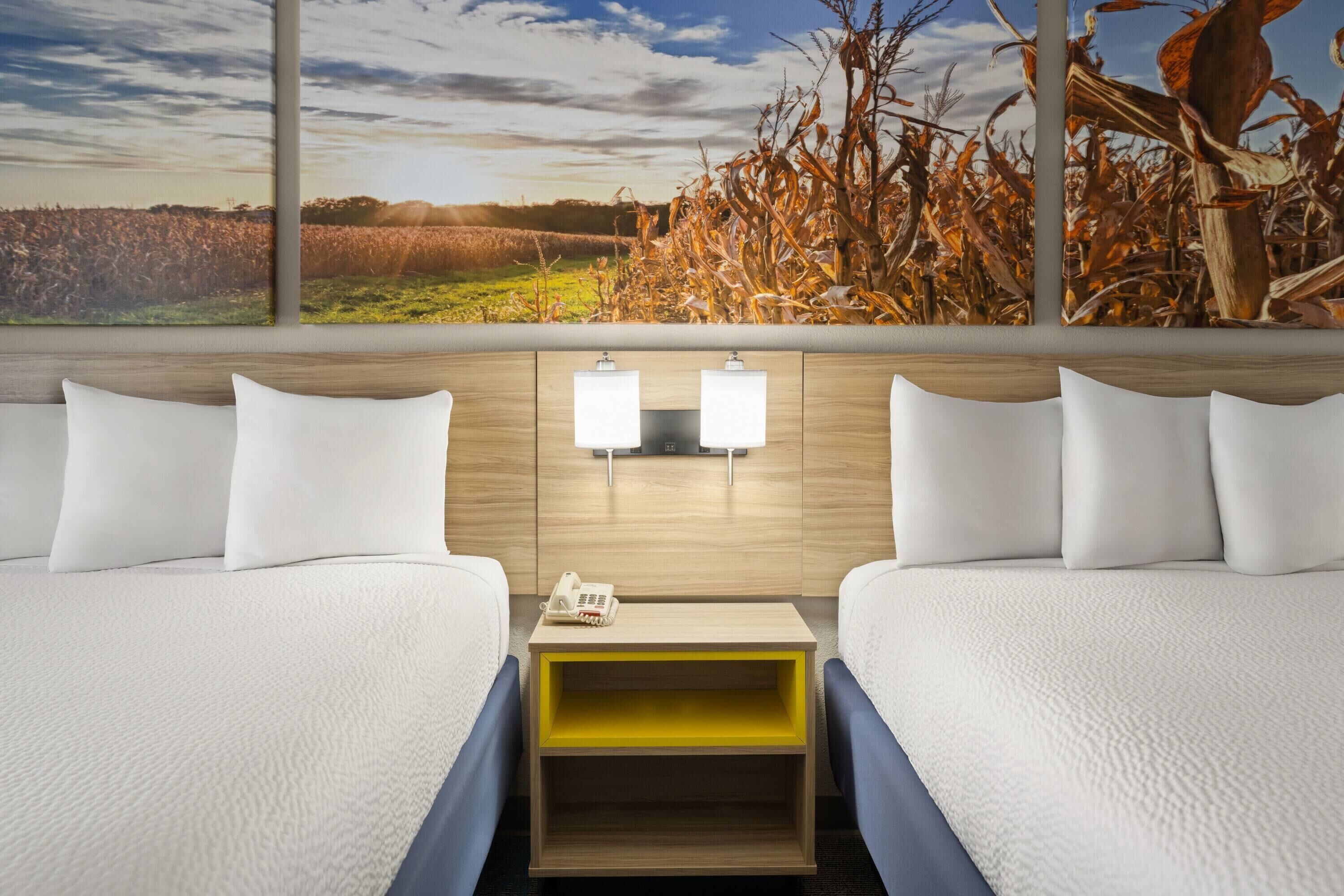 Deluxe Room, 2 Queen Beds, Non Smoking | In-room safe, soundproofing, cribs (free), bed sheets