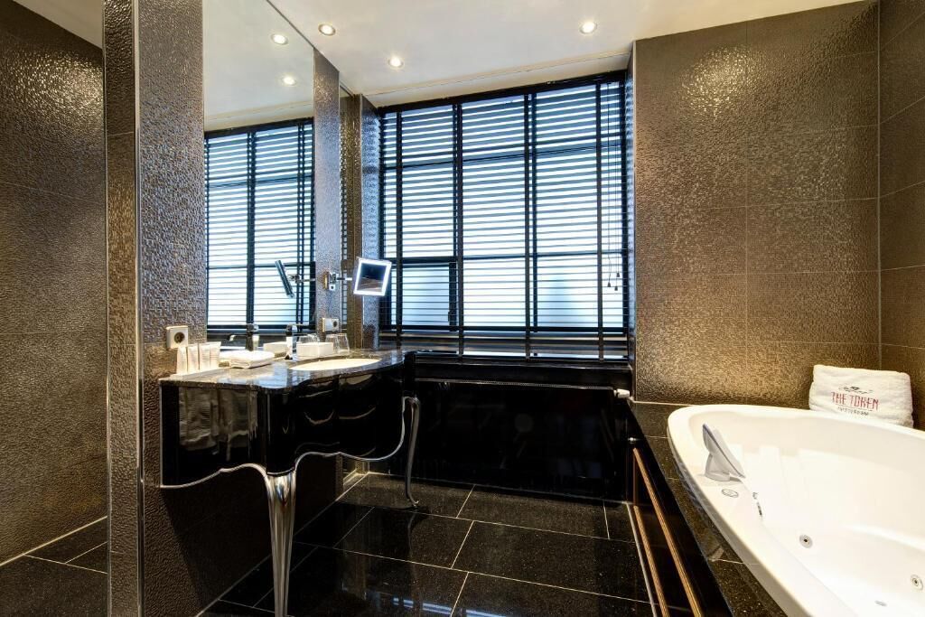 deluxe triple room (special) | bathroom | shower, rainfall showerhead, free toiletries, hair dryer