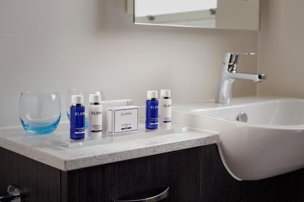 shower, designer toiletries, hair dryer, bathrobes