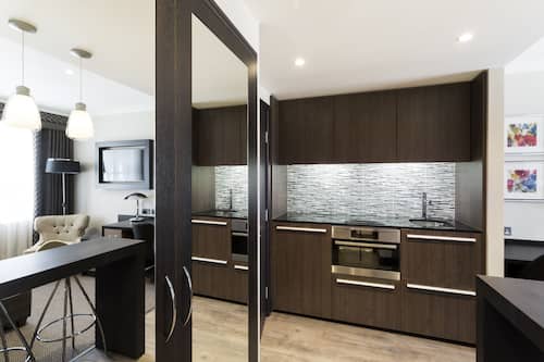 Deluxe One Bedroom Suite (double bed) | Living area | 40-inch flat-screen TV with digital channels, TV