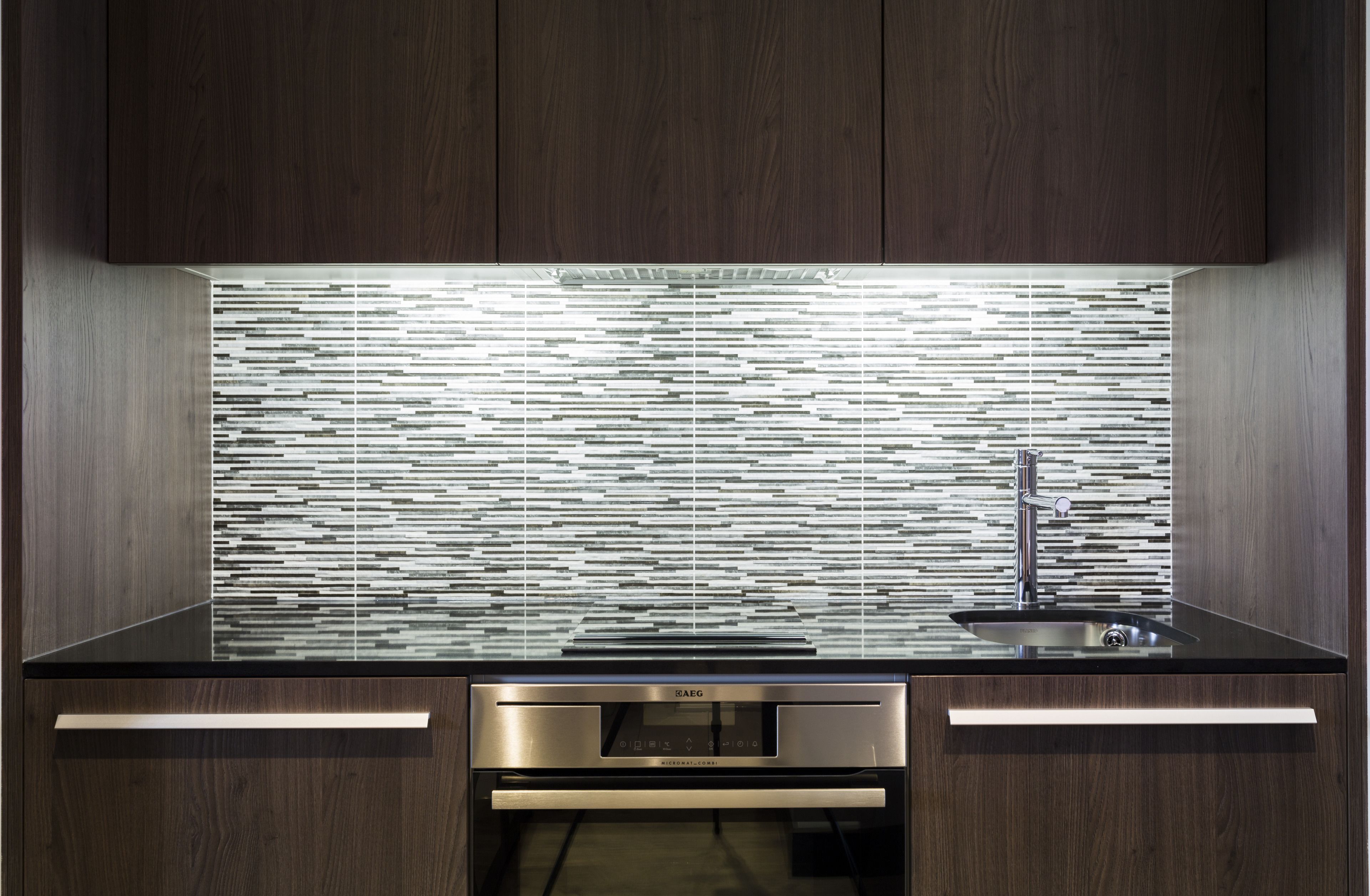 full-sized fridge, microwave, stovetop, electric kettle