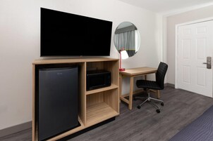 Room, 1 King Bed, Non Smoking | Pillowtop beds, desk, iron/ironing board, free cribs/infant beds