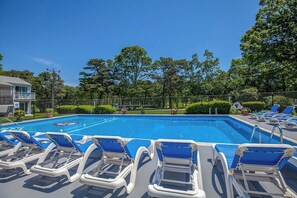 Seasonal outdoor pool, open 9 AM to 8:00 PM, pool umbrellas