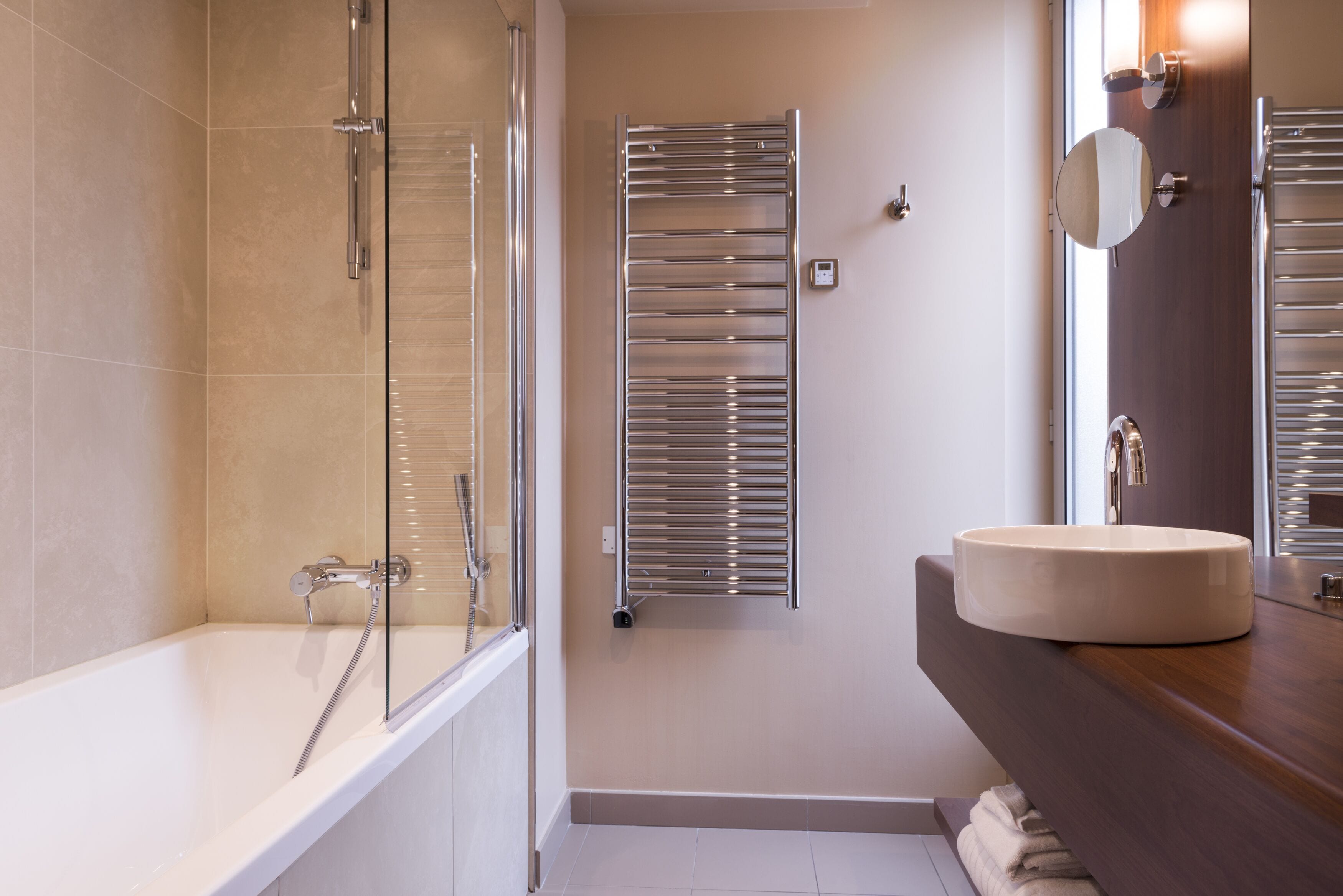 rainfall showerhead, designer toiletries, hair dryer, slippers