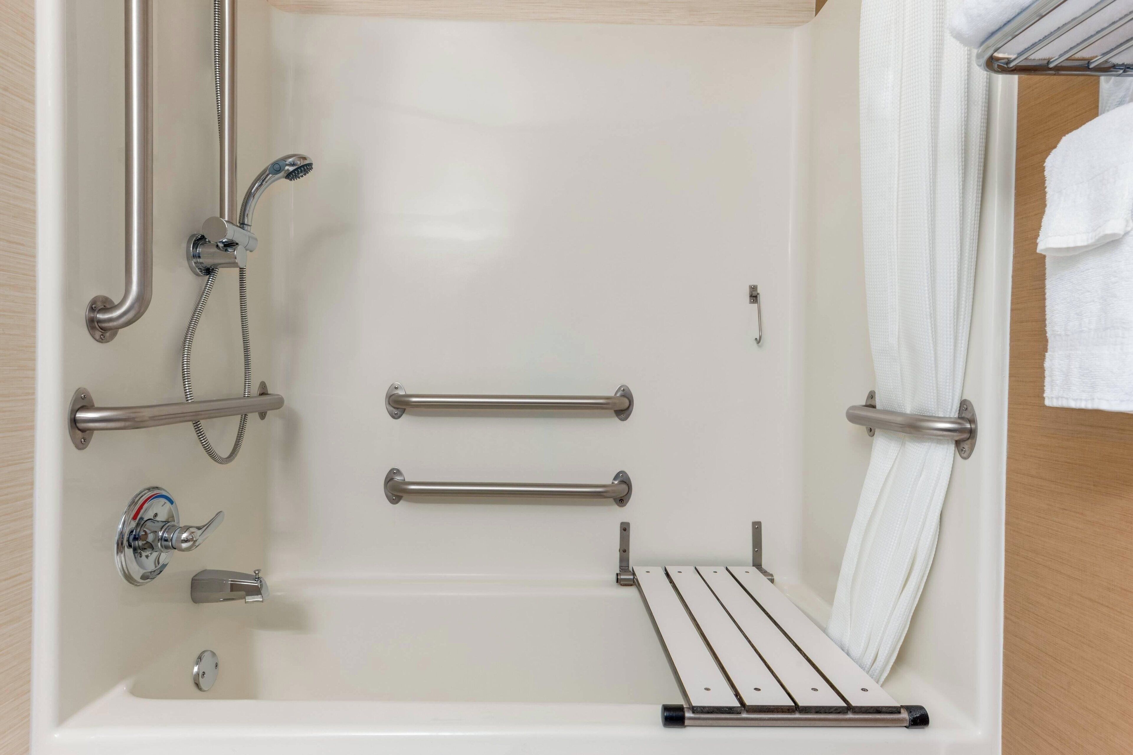 combined shower/bathtub, free toiletries, hair dryer, towels