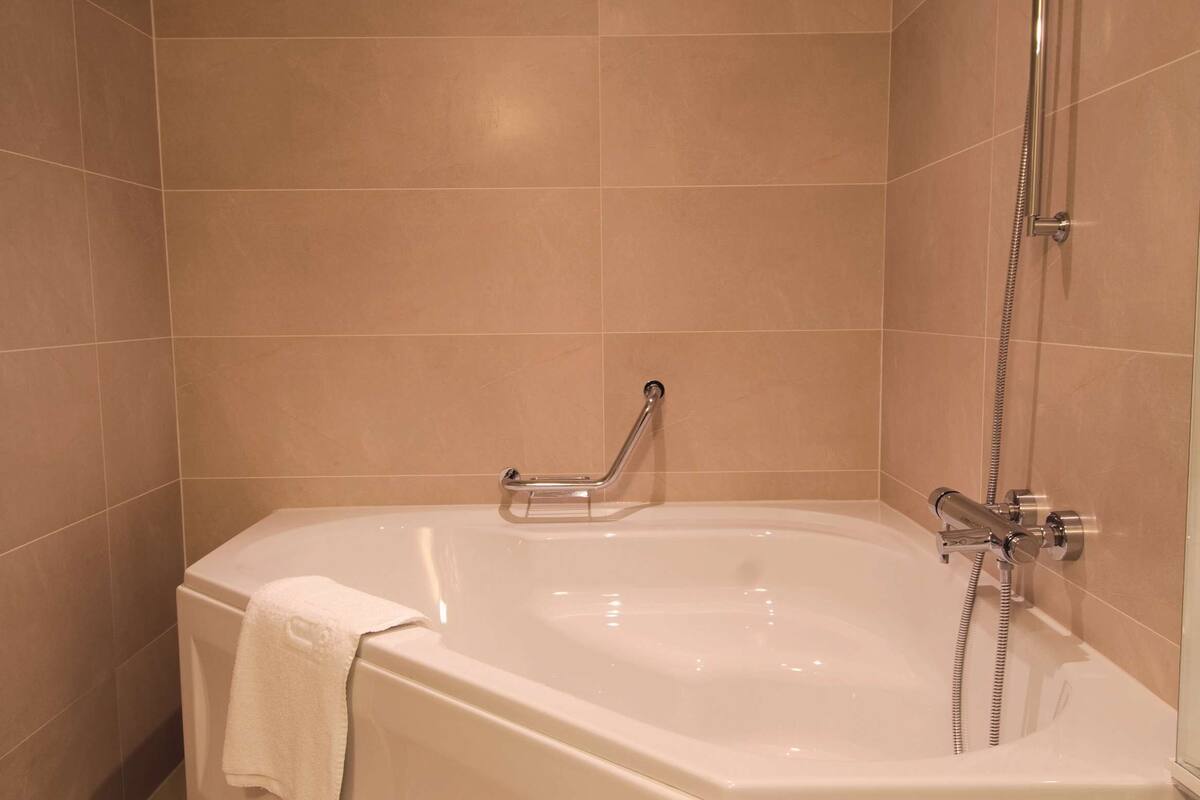 junior suite | 1 bedroom, minibar, in-room safe, desk