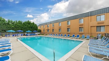 Seasonal outdoor pool, open 8:00 AM to 7:00 PM, pool loungers