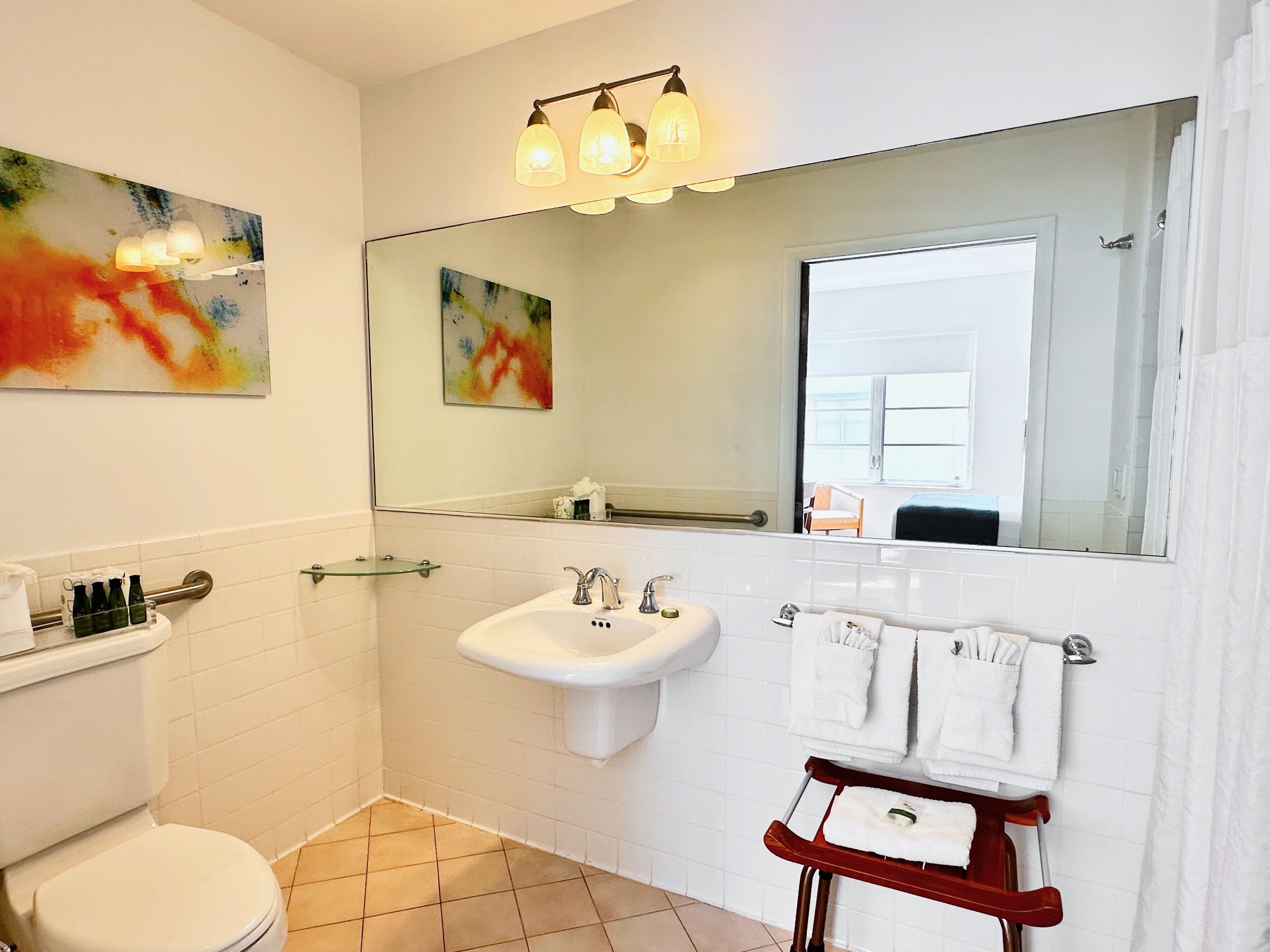 room, 1 queen bed, partial ocean view | bathroom | designer toiletries, hair dryer, bathrobes, slippers