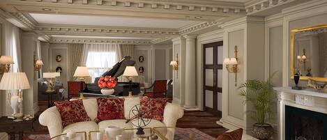 Una sala de estar lujosa con un piano de cola, muebles elegantes y decoración clásica.