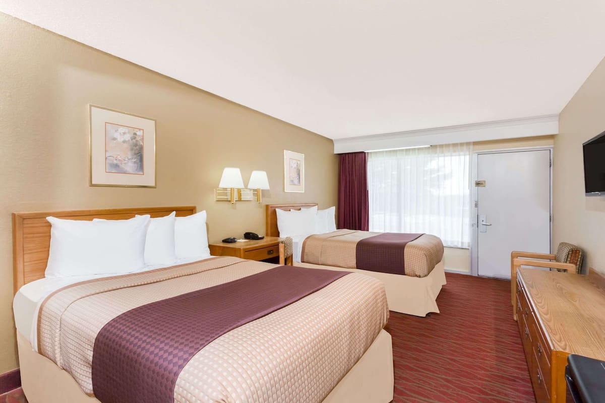 Pillow-top beds, desk, blackout curtains, iron/ironing board