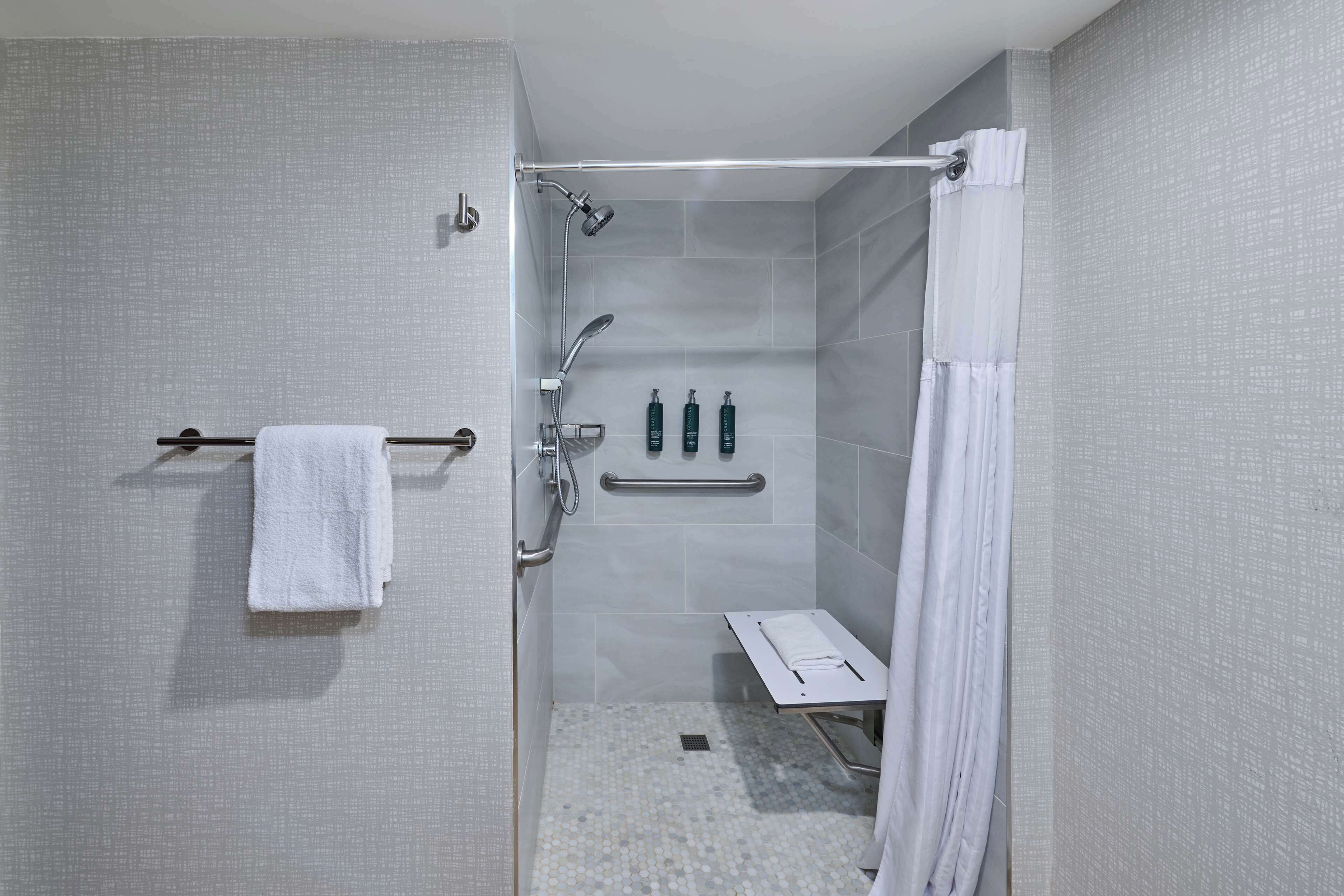 deluxe room, 1 king bed, accessible (roll-in shower) | bathroom shower