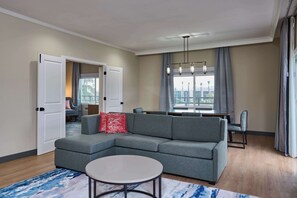 Suite, 1 King Bed | Living area | 55-inch Smart TV with cable channels, Netflix, streaming services