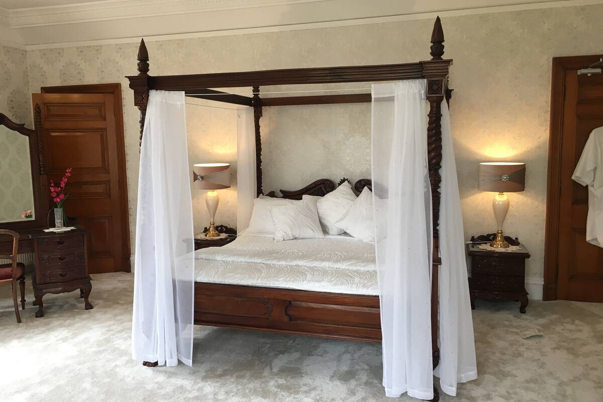 individually decorated, iron/ironing board, cots/infant beds