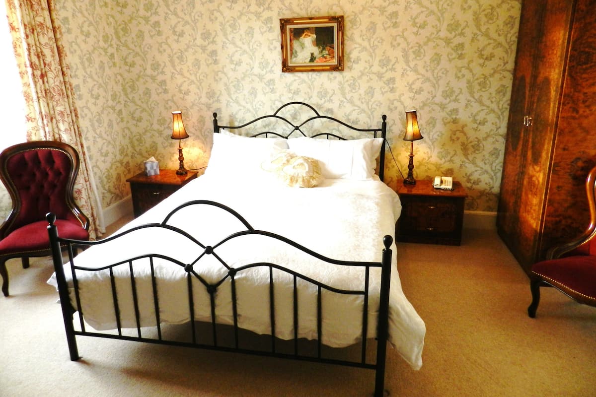 Individually decorated, iron/ironing board, cots/infant beds
