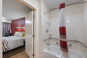 Deluxe Room, 1 King Bed, Accessible (Smoke Free) | Bathroom | Combined shower/tub, towels