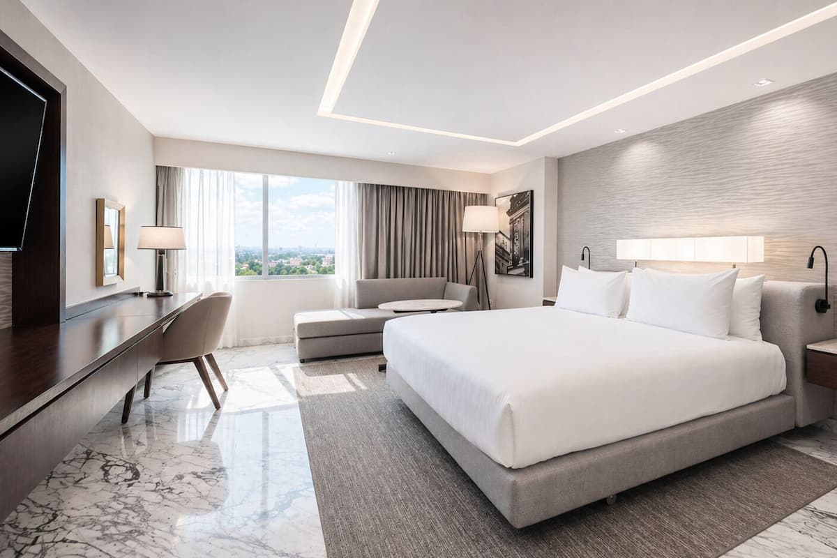 Suite, 1 King Bed (Regency) | 1 bedroom, minibar, in-room safe, individually furnished